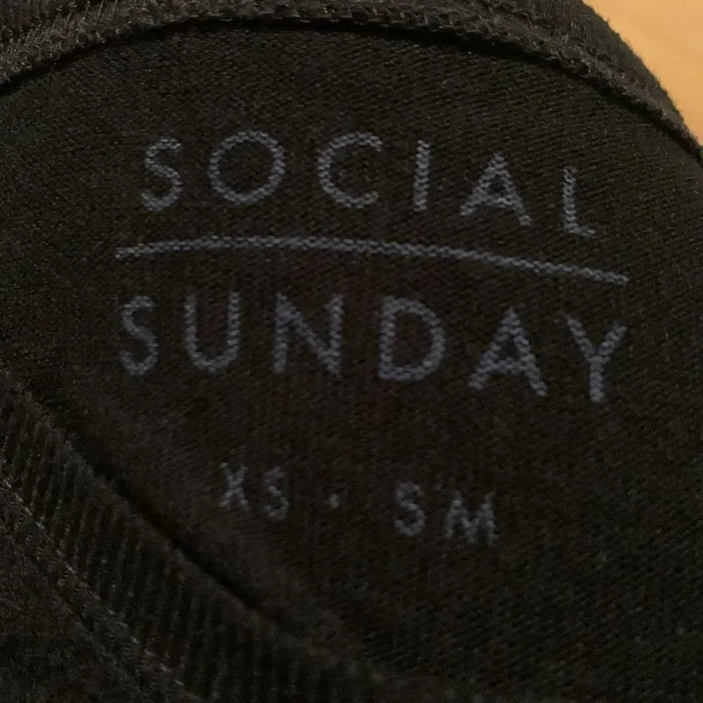 Social Sunday black lightweight sweaterlike graphic top. XS-S.